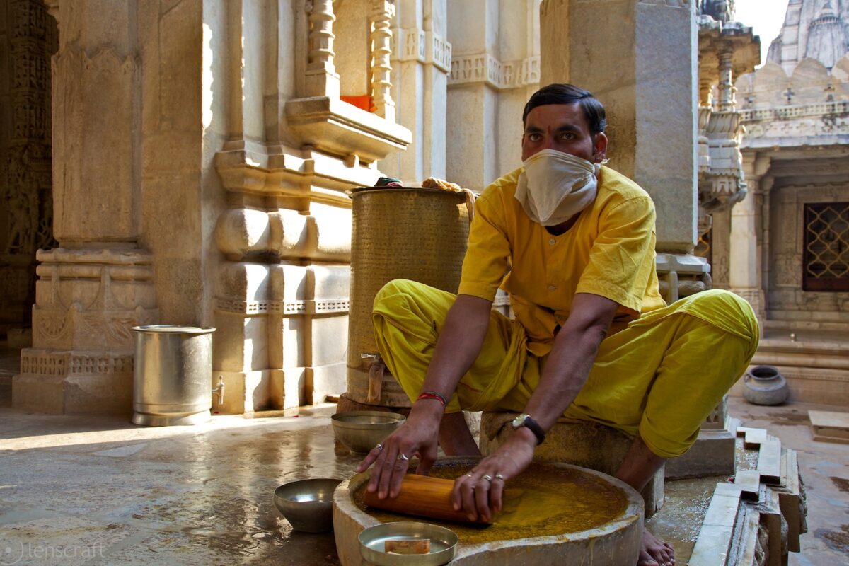 making vermilion powder / jain temple, india