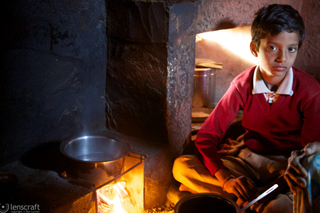 the boy by the cooking fire / osian, india